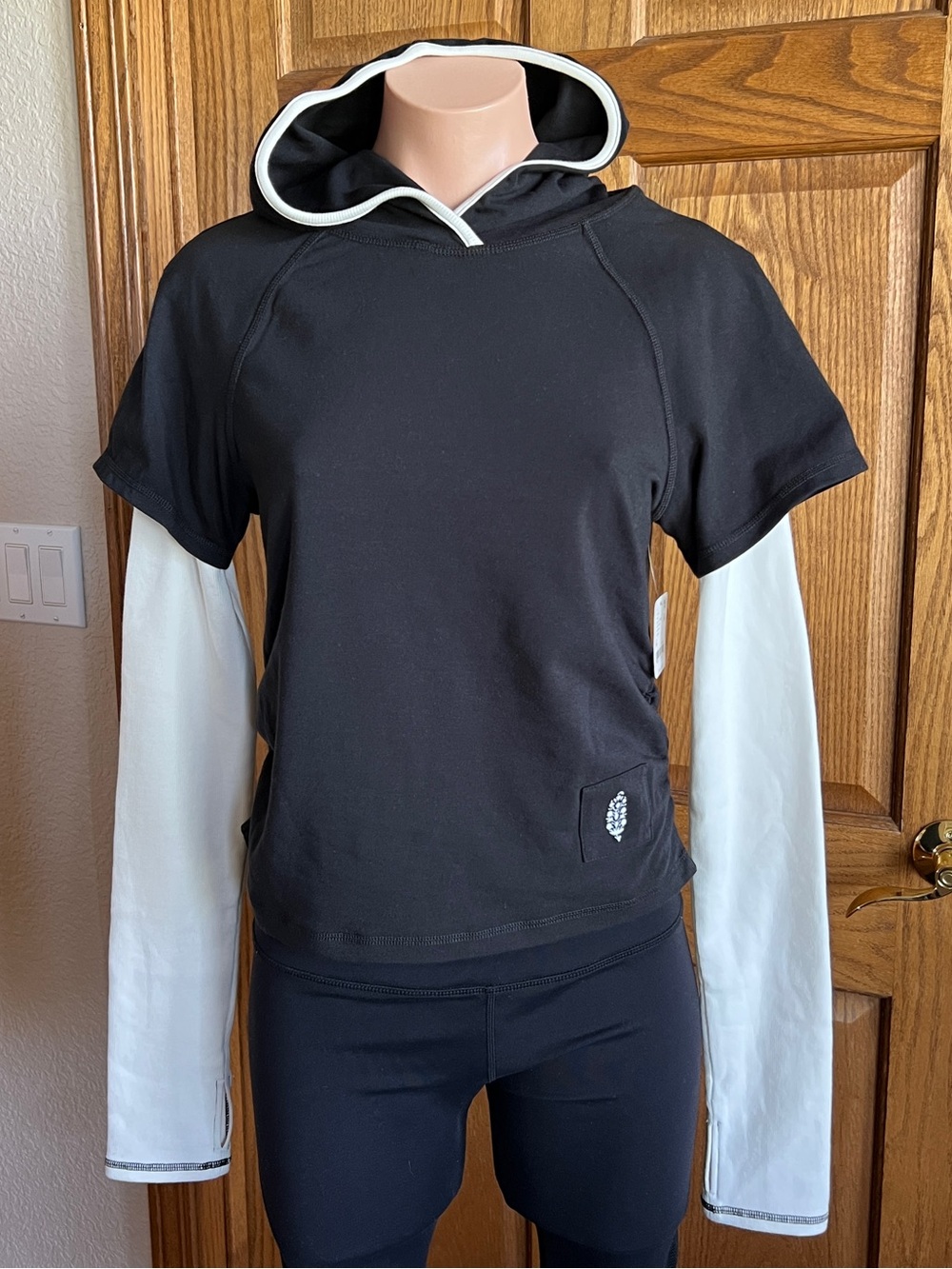 FP Movement by Free People Black Hooded Top with White Long Sleeves